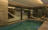 Chalet individuel de luxe avec hammam, piscine intérieure privée chauffée, sauna, salles de massage, de sport et de cinéma – 7 chambres – 14 voyageurs – 500 m²