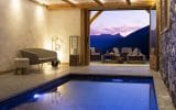 Chalet individuel luxe avec piscine intérieure chauffée et sauna – 6 chambres – 18 voyageurs – 500 m²
