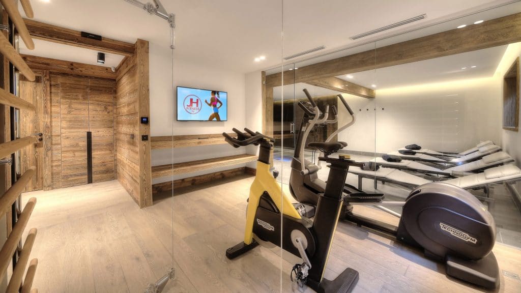 Chalet individuel avec hammam, jacuzzi intérieur, salles de massage, de sport, de cinéma et de jeux – 6 chambres – 16 voyageurs – 520 m²