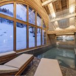 Chalet luxe avec piscine intérieure chauffée et salle de massage – 5 chambres – 12 voyageurs – 250 m²