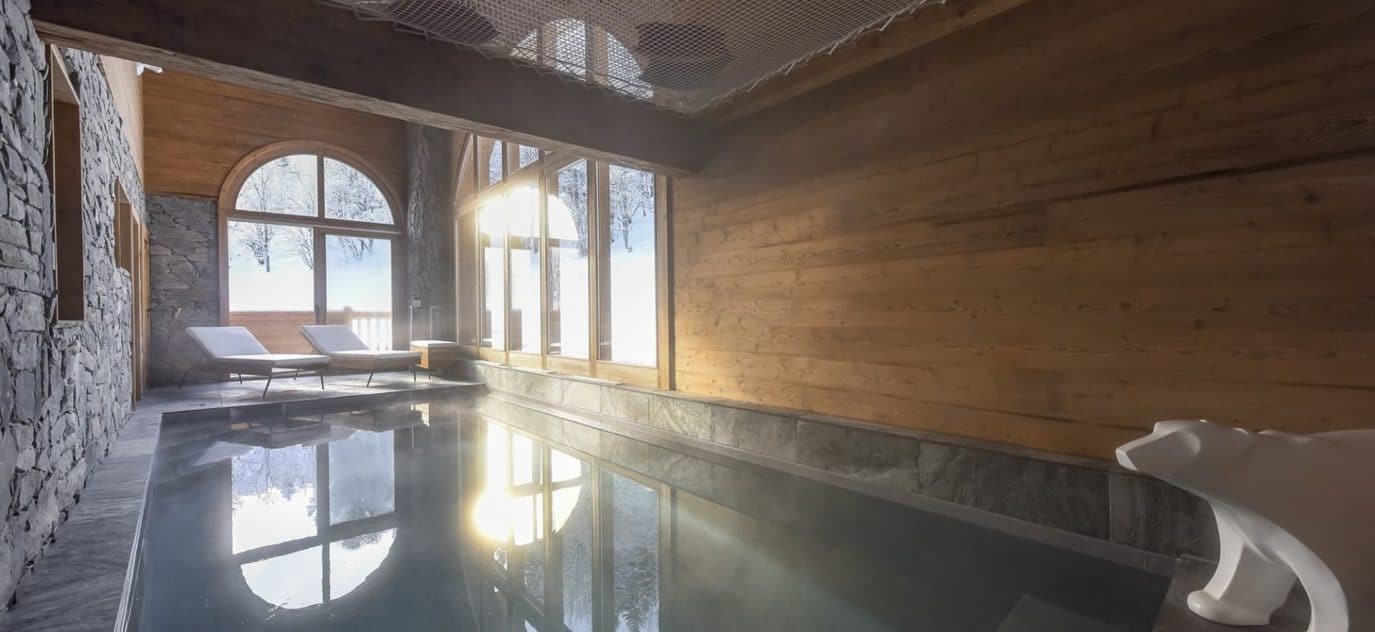 Chalet luxe avec piscine intérieure chauffée et salle de massage – 5 chambres – 12 voyageurs – 250 m²