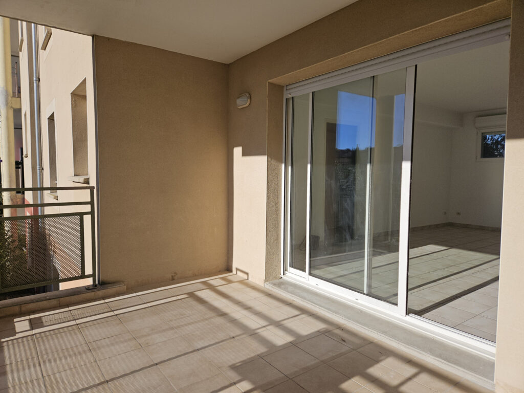 Appartement T3 avec balcon et parking – 3 pièces – 2 chambres – 59 m²