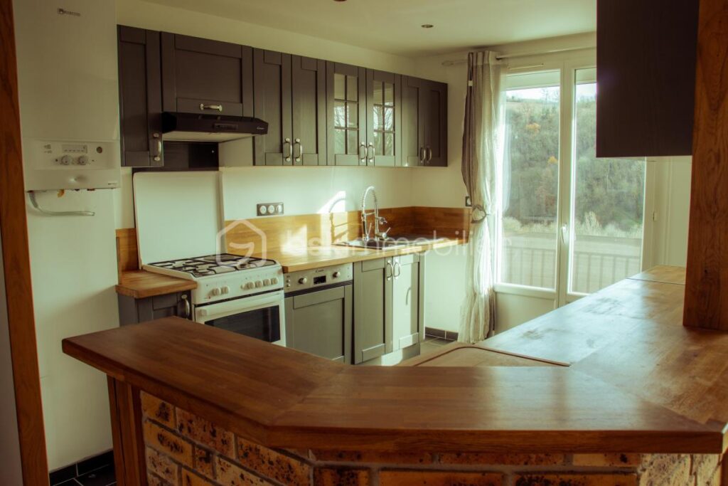 T3 avec balcon, cave et garage, proche du centre-ville – 3 pièces – 2 chambres – 62 m²