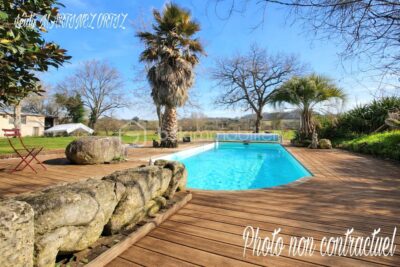 Maison en pierre, rénovée ,220m², 3 chambres , studio indépendant, dépendances , terrain 5500m²environ – 7 pièces – 4 chambres – 215 m²