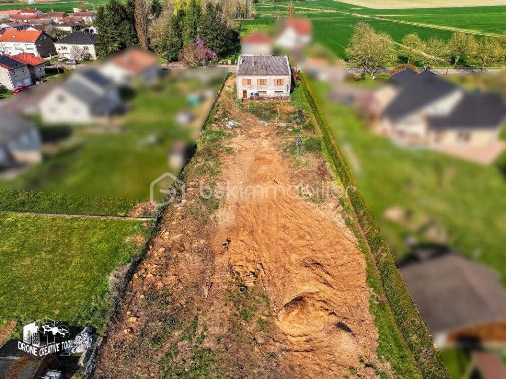 Terrain constructible 1 300 m² + verger – Hors lotissement – Libre constructeur – Secteur Boulay (A4) – NR pièces – NR chambres – 1300 m²