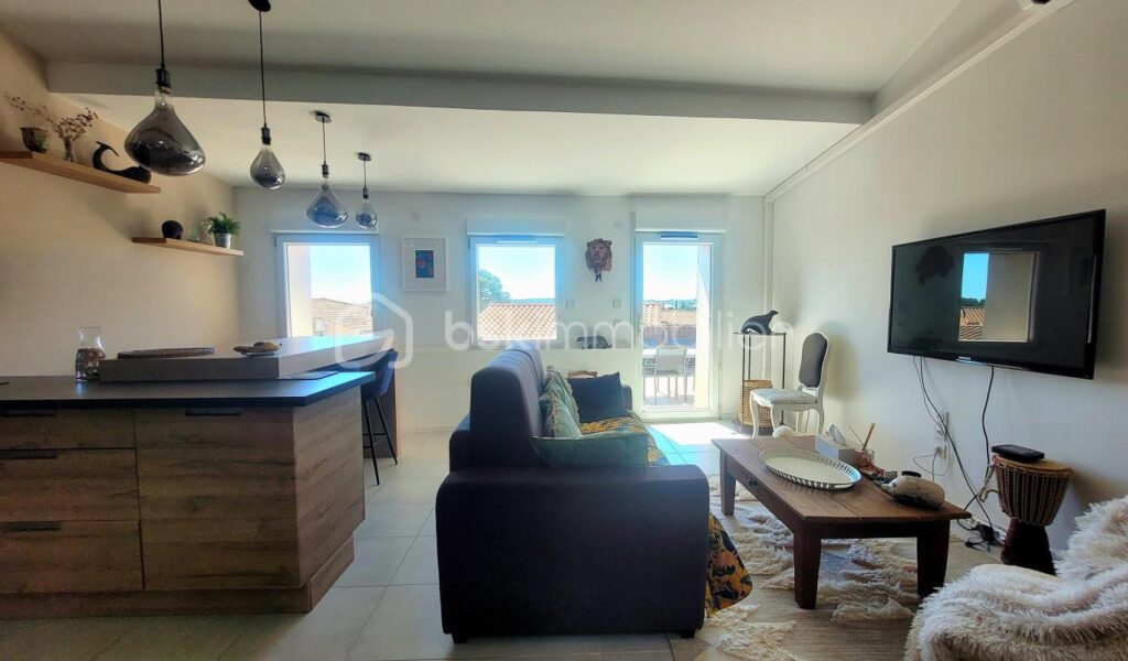 APPARTEMENT ESPRIT LOFT, DEUX CHAMBRES ET TERRASSE AVEC BELLE VUE DEGAGEE – 3 pièces – 2 chambres – 62 m²