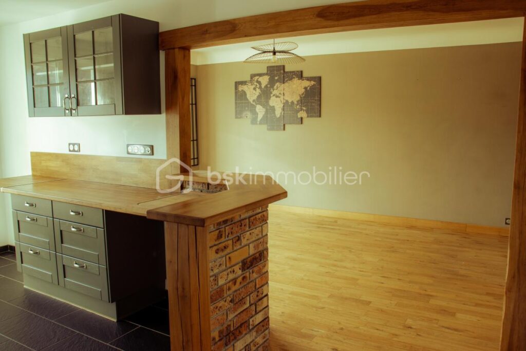 T3 avec balcon, cave et garage, proche du centre-ville – 3 pièces – 2 chambres – 62 m²