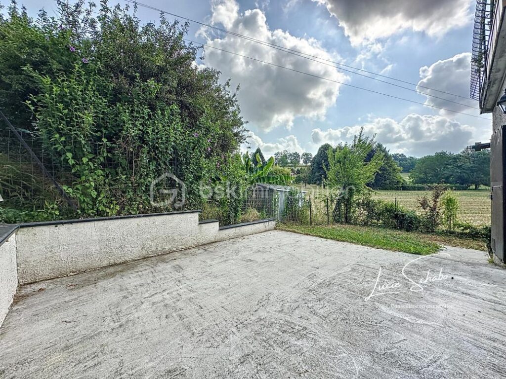 Appartement T3 en rez-de-jardin – 65 m² avec terrain privatif – 3 pièces – 2 chambres – 64 m²