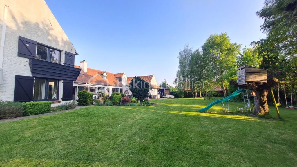 Rare sur Fretin Nouveauté ! Maison individuelle semi-plain pied de 290 m² – 6 chambres + double garage + jardin + 2 appartements – 12 pièces – 6 chambres – 290 m²