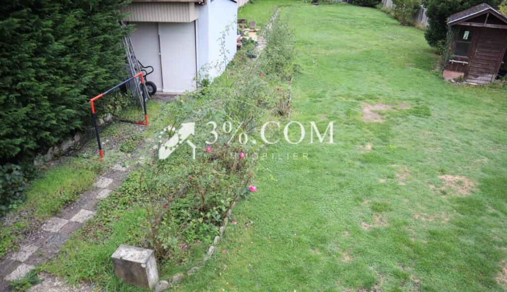 Maison 4 chambres, jardin, garages – 6 pièces – 4 chambres – 141 m²