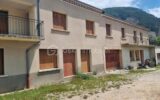 Grande maison avec garage, 2 logements et 530 m² de terrain constructible – 14 pièces – 9 chambres – 290 m²