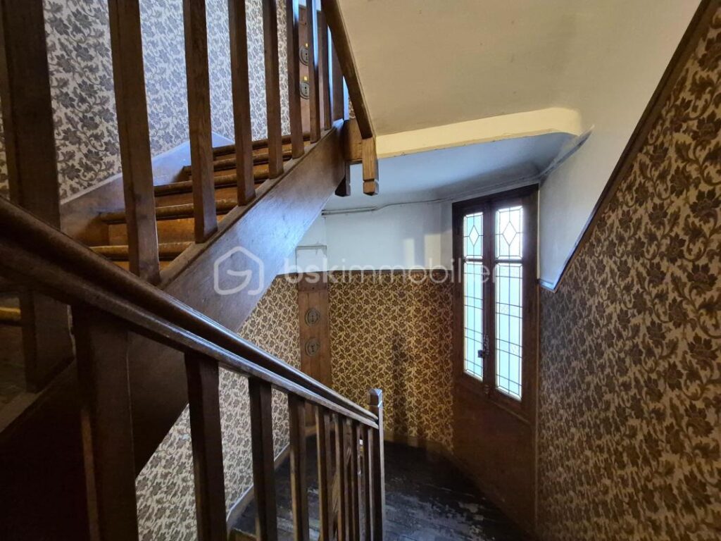 DERNIER ETAGE AVEC BALCON ET VUE SPECTACULAIRE SUR PARIS ET LA DEFENSE – 3 pièces – 2 chambres – 59 m²