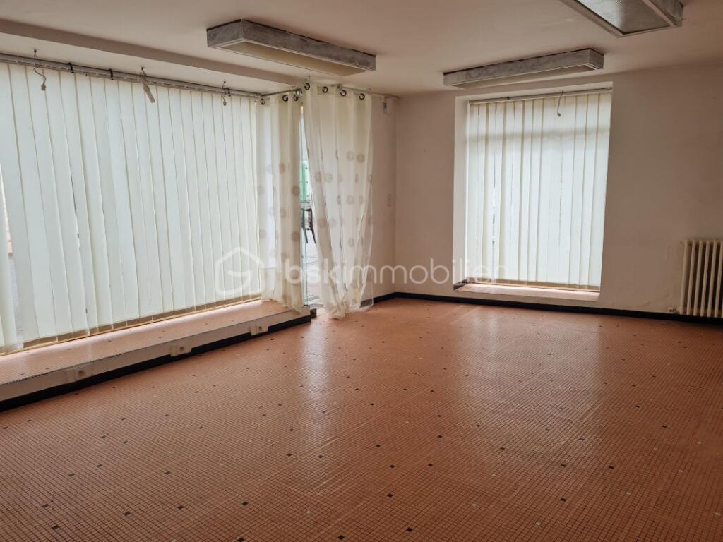 Immeuble au cœur du village – 4 pièces – NR chambres – 111 m²