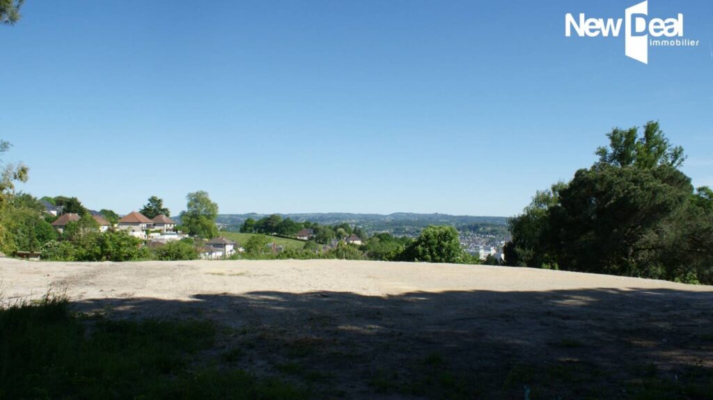 Terrain viabilisé 1005 m² avec superbe vue – NR pièces – NR chambres – 1005 m²