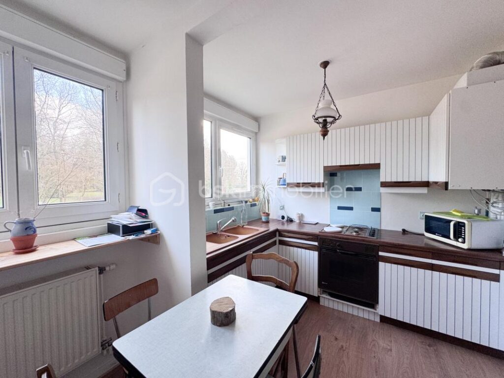 COUP DE CŒUR ASSURÉ – F2 52,14 m² – BALCON VUE PARC – PARKING & CAVE – 2 pièces – 1 chambre – 52 m²