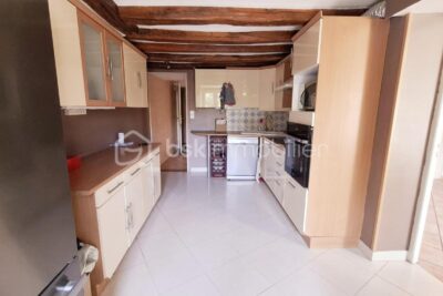 UN SUPERBE APPARTEMENT AVEC UN BEAU JARDIN – 5 pièces – 3 chambres – 131 m²