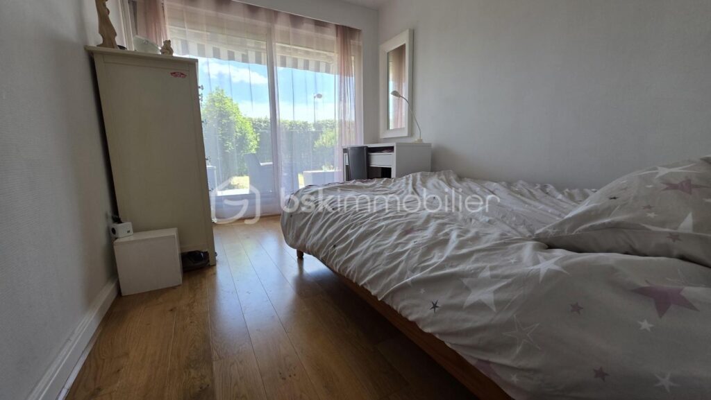 Appartement F3 – 75 m2 – jardin – cave – box privatif – vue LAC – 3 pièces – 2 chambres – 75 m²