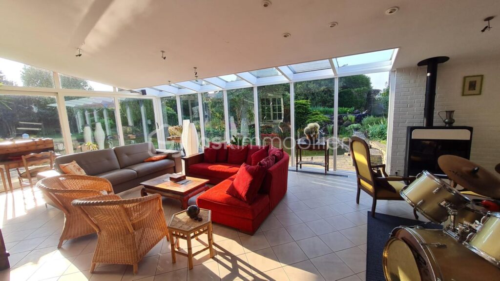 Rare sur Fretin Nouveauté ! Maison individuelle semi-plain pied de 290 m² – 6 chambres + double garage + jardin + 2 appartements – 12 pièces – 6 chambres – 290 m²