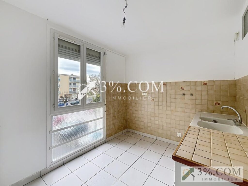 Appartement T3 avec balcon , cave et garage – 3 pièces – 2 chambres – 65 m²