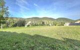 Terrain de 1148 m2 non viabilisé -plein sud et vue dégagée – NR pièces – NR chambres – 1148 m²