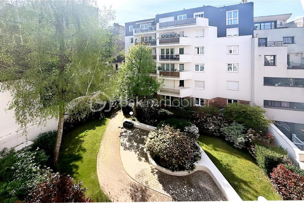 Beau 2 pièces avec balcon plein sud sur Jardin avec Parking et cave – 2 pièces – 1 chambre – 48 m²
