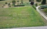 TERRAIN CONSTRUCTIBLE PROCHE MONNAIE – NR pièces – NR chambres – 1349 m²