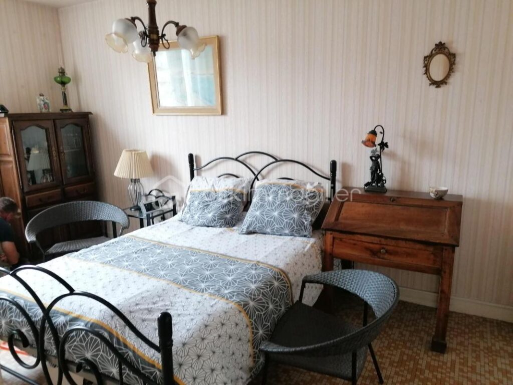 APPARTEMENT avec cave privative et un garage – 4 pièces – 2 chambres – 70 m²