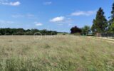 TERRAIN CONSTRUCTIBLE PROCHE MONNAIE – NR pièces – NR chambres – 1349 m²