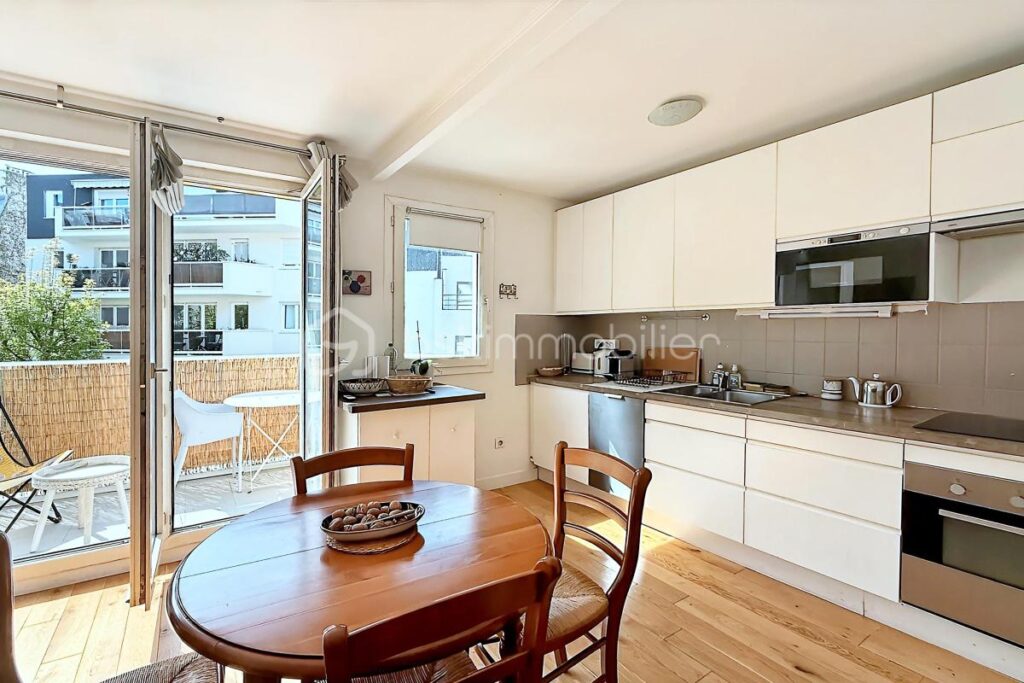 Beau 2 pièces avec balcon plein sud sur Jardin avec Parking et cave – 2 pièces – 1 chambre – 48 m²