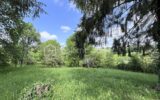 Terrain avec vue sur la campagne – Cadre verdoyant et préservé – NR pièces – NR chambres – 1587 m²