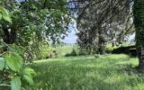 Terrain avec vue sur la campagne – Cadre verdoyant et préservé – NR pièces – NR chambres – 1587 m²