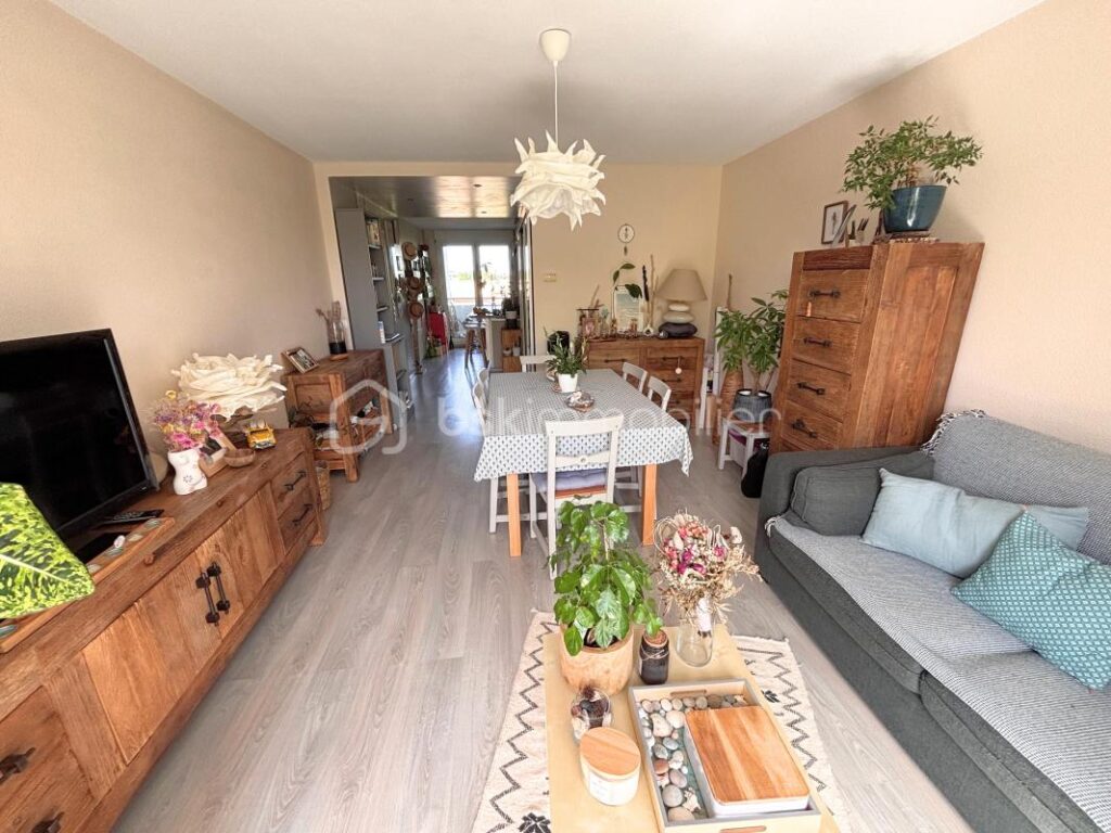 T3 traversant de 68 m² avec terrasse, balcon et parking – Hyper-centre de Bruges – 3 pièces – 2 chambres – 69 m²