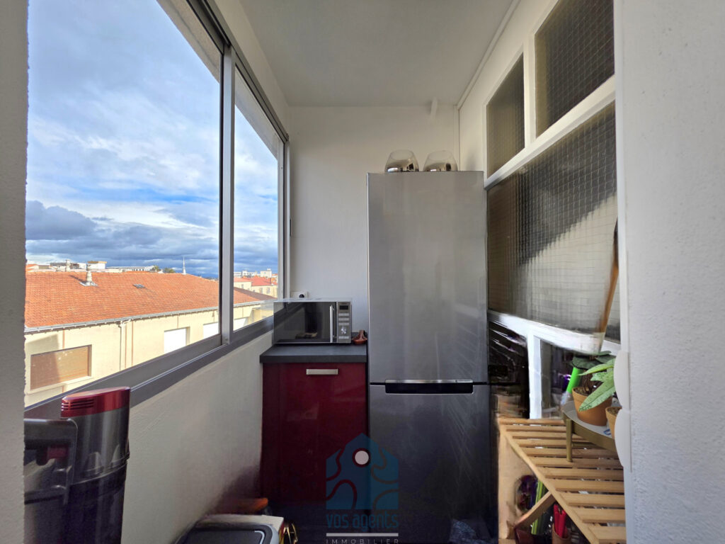 Appartement 3 pièces avec balcon, cave, et parking couvert – 3 pièces – 2 chambres – 59.7 m²