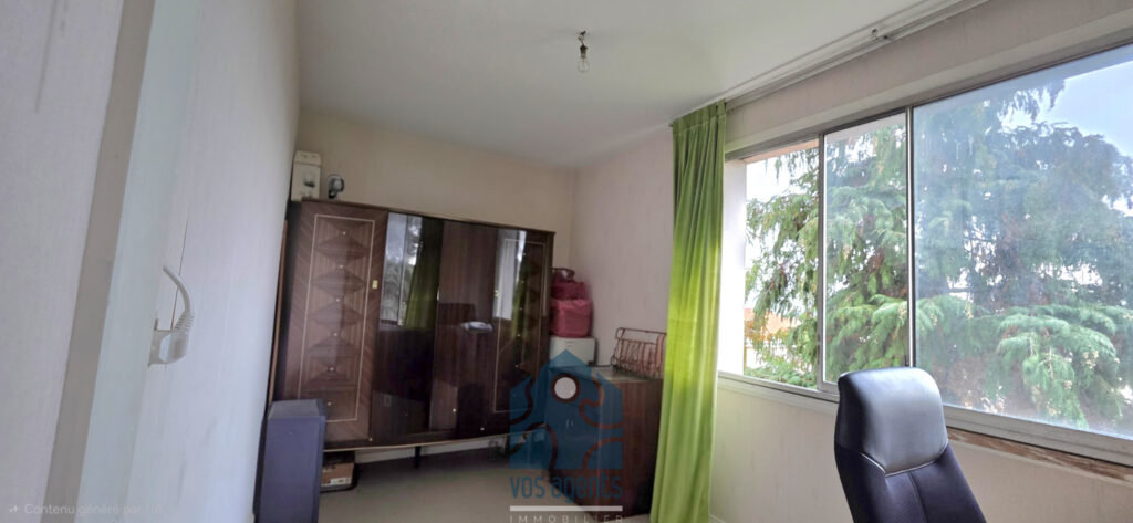 Appartement T4 avec balcon, parking couvert et annexes – 4 pièces – 3 chambres – 68.52 m²