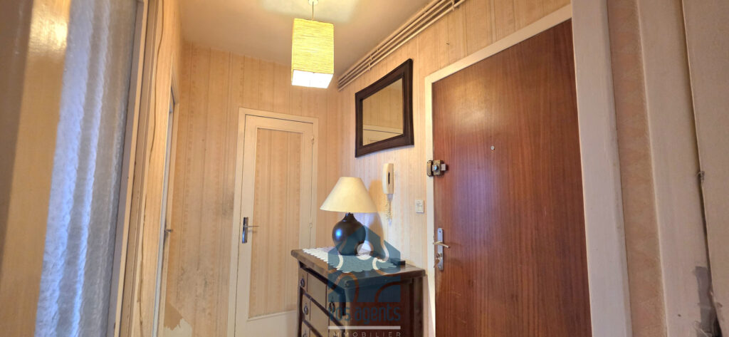Appartement T4 avec balcon, parking couvert et annexes – 4 pièces – 3 chambres – 68.52 m²