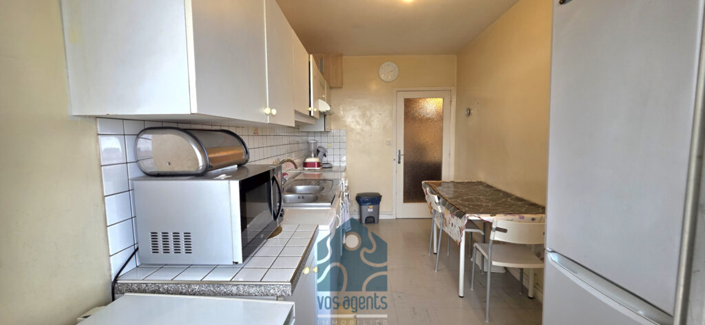 Appartement T4 avec balcon, parking couvert et annexes – 4 pièces – 3 chambres – 68.52 m²