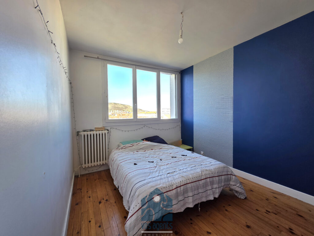 Appartement 3 pièces avec balcon, cave et stationnement – 3 pièces – 2 chambres – 61.5 m²