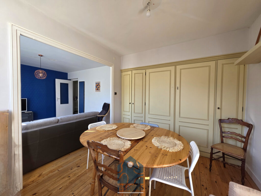 Appartement 3 pièces avec balcon, cave et stationnement – 3 pièces – 2 chambres – 61.5 m²