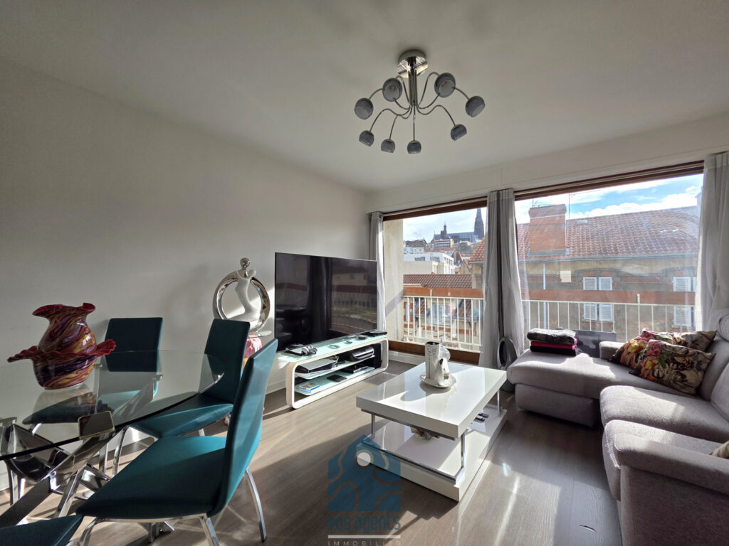 Appartement 3 pièces avec balcon, cave, et parking couvert – 3 pièces – 2 chambres – 59.7 m²