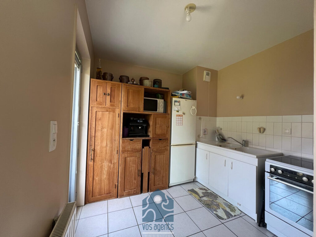 Appartement 3 pièces avec balcon et garage – 3 pièces – 2 chambres – 70 m²