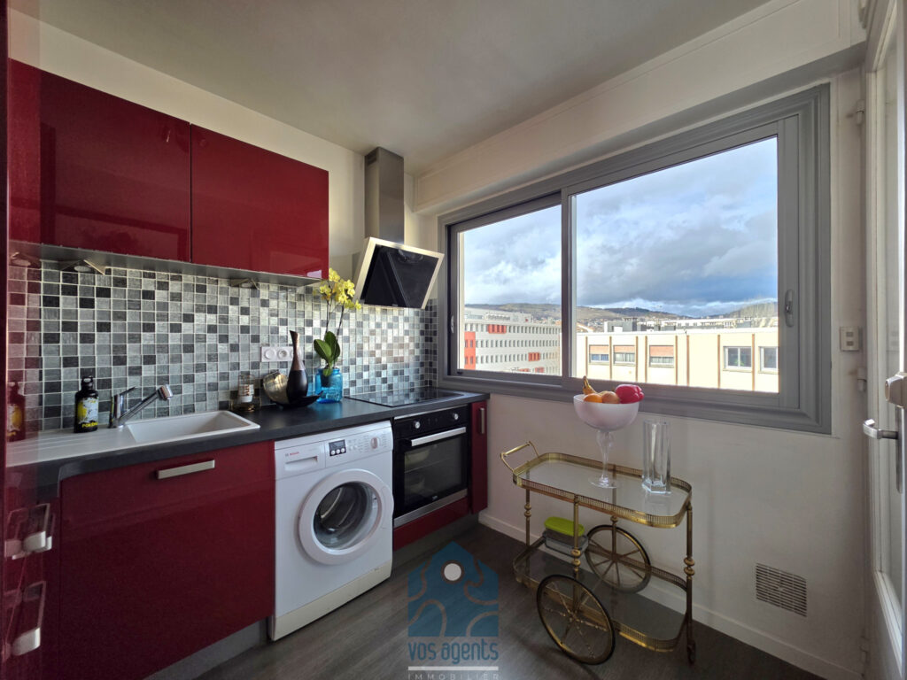 Appartement 3 pièces avec balcon, cave, et parking couvert – 3 pièces – 2 chambres – 59.7 m²