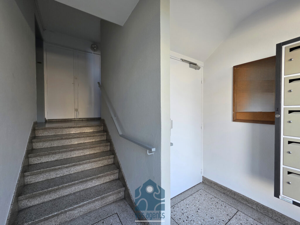 Appartement 3 pièces avec balcon, cave et stationnement – 3 pièces – 2 chambres – 61.5 m²