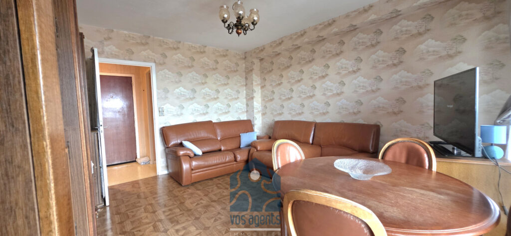 Appartement T4 avec balcon, parking couvert et annexes – 4 pièces – 3 chambres – 68.52 m²