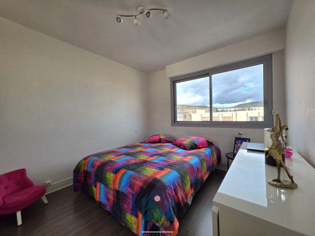 Appartement 3 pièces avec balcon, cave, et parking couvert – 3 pièces – 2 chambres – 59.7 m²