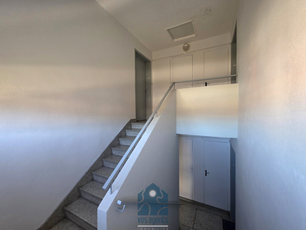Appartement 3 pièces avec balcon, cave et stationnement – 3 pièces – 2 chambres – 61.5 m²
