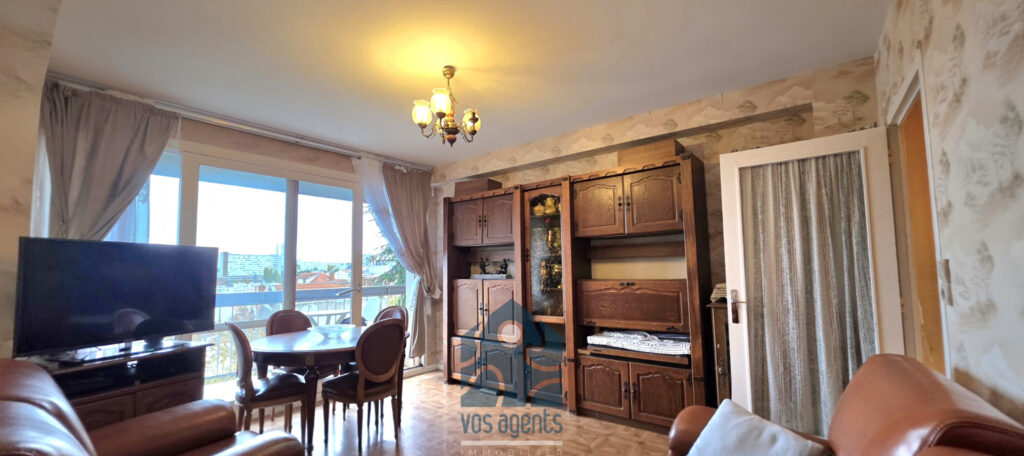 Appartement T4 avec balcon, parking couvert et annexes – 4 pièces – 3 chambres – 68.52 m²