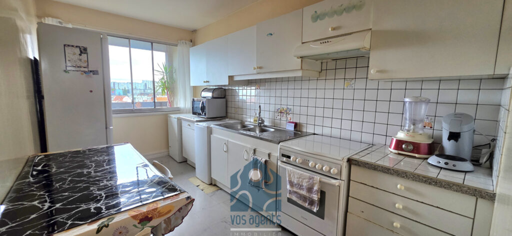 Appartement T4 avec balcon, parking couvert et annexes – 4 pièces – 3 chambres – 68.52 m²