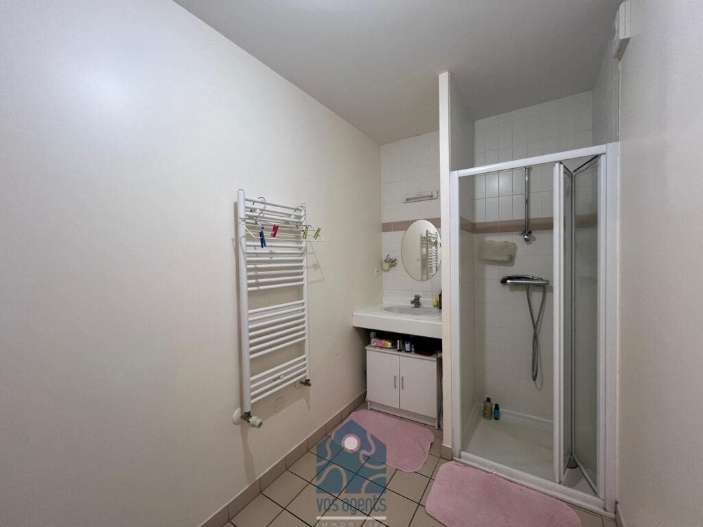 Appartement 3 pièces avec balcon et garage – 3 pièces – 2 chambres – 70 m²