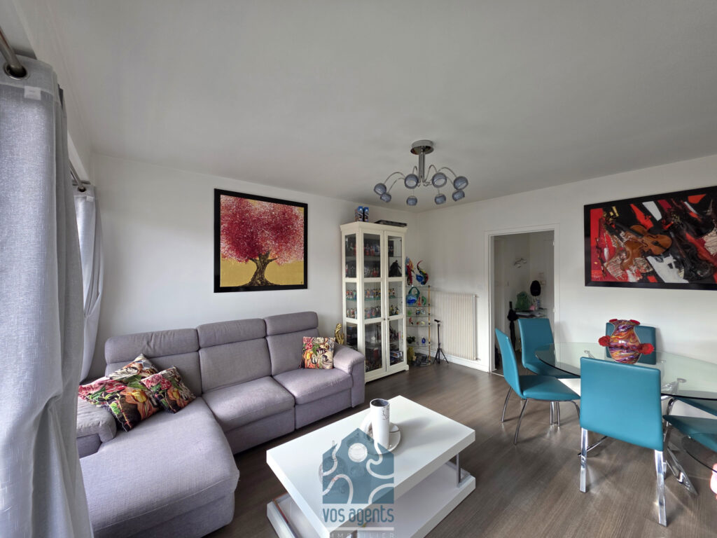 Appartement 3 pièces avec balcon, cave, et parking couvert – 3 pièces – 2 chambres – 59.7 m²