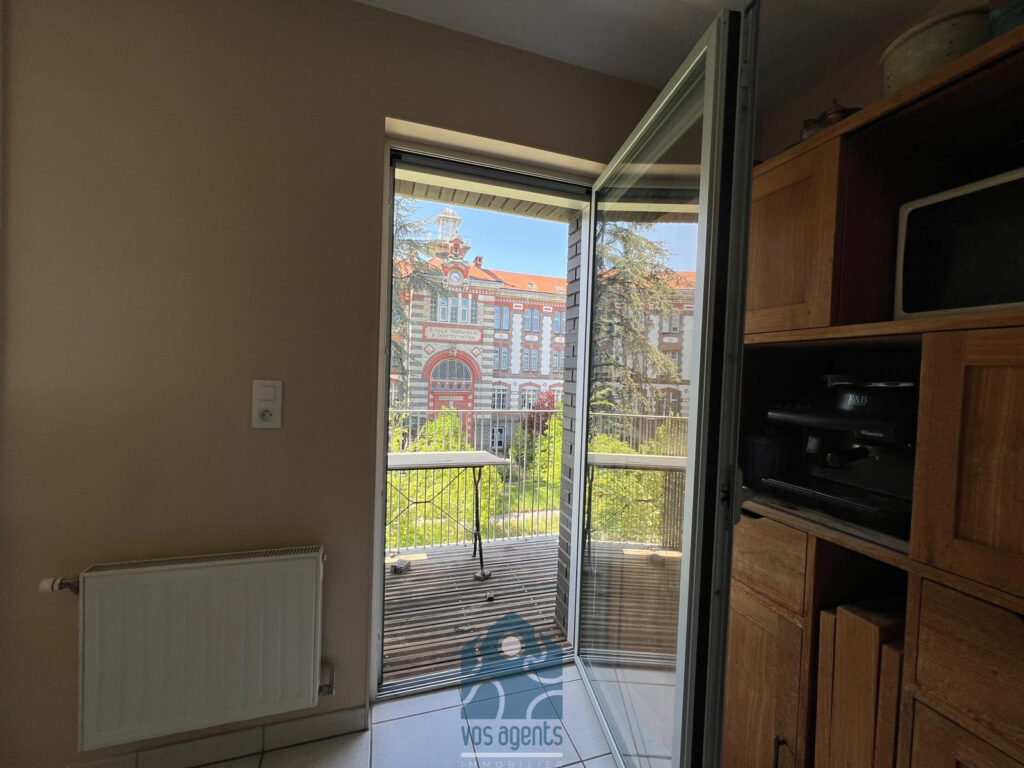 Appartement 3 pièces avec balcon et garage – 3 pièces – 2 chambres – 70 m²